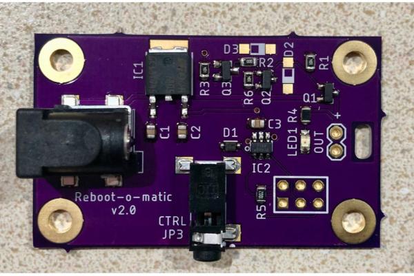 REBOOT O MATIC IS AN AUTOMATIC POWER CYCLING MICROCONTROLLER AND A DC POWER INTERRUPTING WATCHDOG